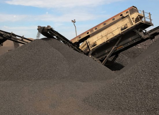 Large piles of manganese ore rock created by huge special machines in South Africa